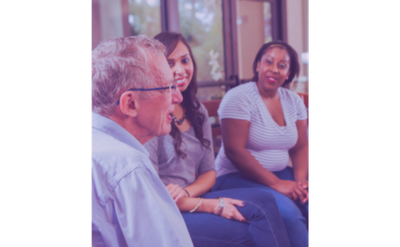 Bereavement Group_web image A diverse group of adults, seated in a circle, provide emotional support to each other.